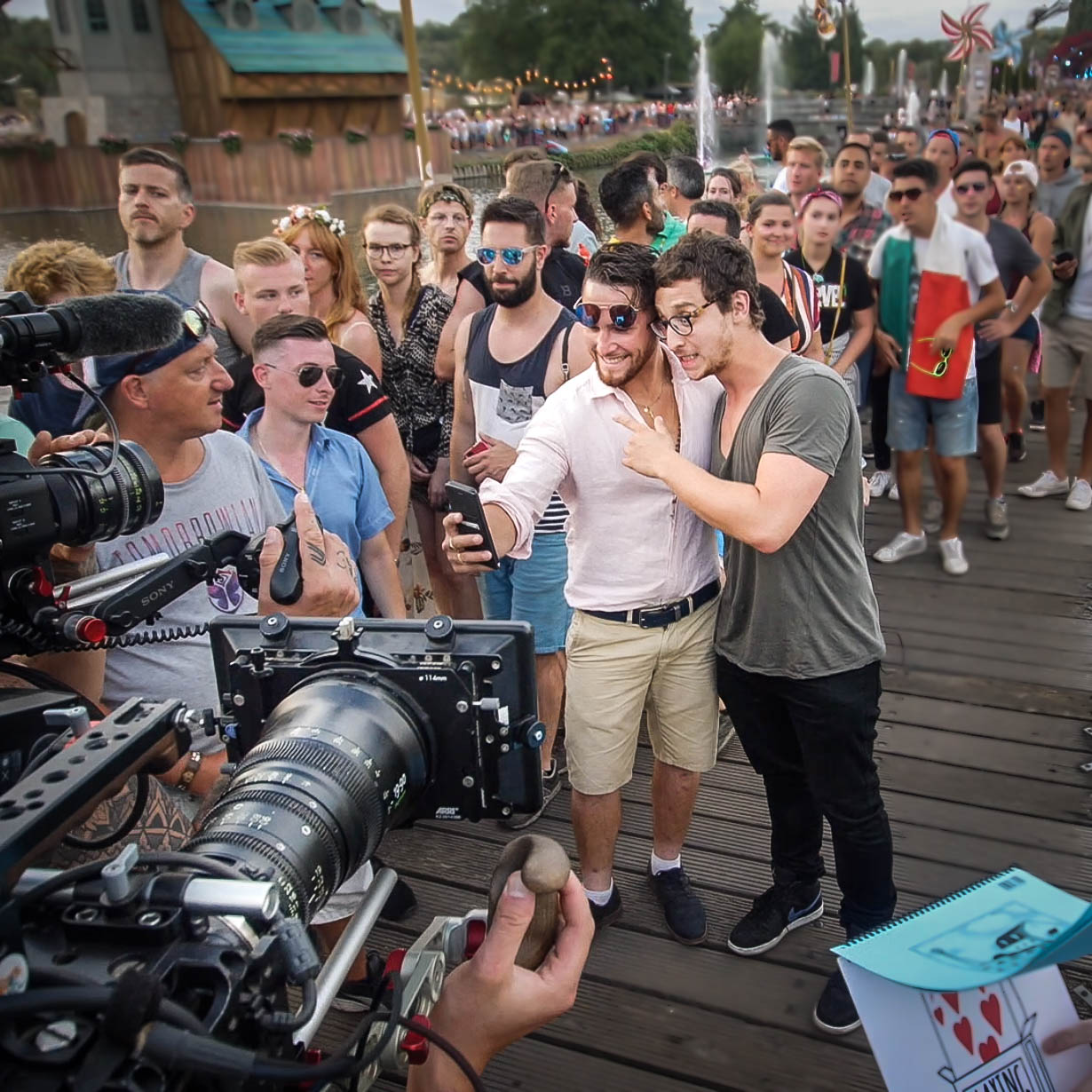 Julius taking pictures with fans after a show